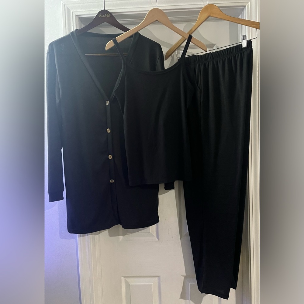 All black knitted Jacket, tank top and pants